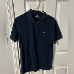 Vineyard Vines polo.